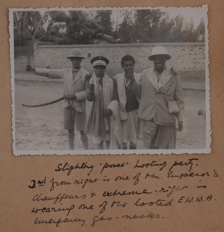 Item #439 [Collection of Three Albums with ca. 307 Original Gelatin Silver Photos, Taken and Collected by a British Vice-Consul in Addis Ababa Shortly Before and During the Second Italo-Ethiopian War, Showing Addis Ababa and Jimma, Emperor Haile Selassie I, German and Italian Ambassadors in Ethiopia, Members of the British Legation, Italian Military Planes and Airfield at Mekelle, Bombing of Ethiopian Troops and Villages, Burning and Looting of Addis Ababa in May 1936, Refugee Camp at the British Legation, etc.; With: a Menu of “A Dinner at the Lansdowne Club on Friday, April 30th 1937, for Those who were in Abyssinia During the Autumn, Winter and Spring of 1935 and 1936,” Signed by Trapman and over a Dozen Other Participants]. AFRICA - ETHIOPIA - SECOND ITALO-ETHIOPIAN WAR, Adrian Sidney Gilbert Reginald TRAPMAN.