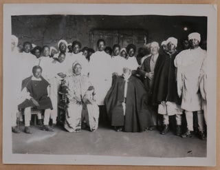 [Collection of Three Albums with ca. 307 Original Gelatin Silver Photos, Taken and Collected by a British Vice-Consul in Addis Ababa Shortly Before and During the Second Italo-Ethiopian War, Showing Addis Ababa and Jimma, Emperor Haile Selassie I, German and Italian Ambassadors in Ethiopia, Members of the British Legation, Italian Military Planes and Airfield at Mekelle, Bombing of Ethiopian Troops and Villages, Burning and Looting of Addis Ababa in May 1936, Refugee Camp at the British Legation, etc.; With: a Menu of “A Dinner at the Lansdowne Club on Friday, April 30th 1937, for Those who were in Abyssinia During the Autumn, Winter and Spring of 1935 and 1936,” Signed by Trapman and over a Dozen Other Participants].