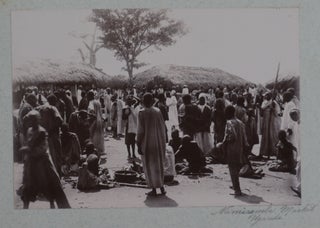 [Album with Fifty-Six Original Gelatin Silver Photographs of British and German East Africa, Including Views of Nairobi, Kisumu, Mombasa, Kampala, Tanga, Magila, Ripon Falls, Lake Victoria, Kabaka Lake, Portraits of Kikuyu, Kavirondo, Kamba People, &c.].