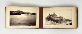 [Album with 46 Rare Original Albumen Photographs, Showing Monterey (Chinatown, Monterey Bay, Hotel del Monte, First Adobe Buildings, Custom House, “The First Jail,” “General Fremont’s Headquarters during the Mexican War,” &c.), San Francisco (“Mrs. Mark Hopkins and Gov. Stanford Mansions,” “Court, Palace Hotel,” “Bazaar in Chinatown,” “The Entry – Chinese Theatre,” “Chinese Grand Restaurant,” “Mission Dolores”), Salt Lake City (“Brigham Young’s Grave,” “The Eagle Gate near Brigham Young’s Residence,” “Temple Block,” “Beehive and Lion House”), Chinatown in Los Angeles, &c.].
