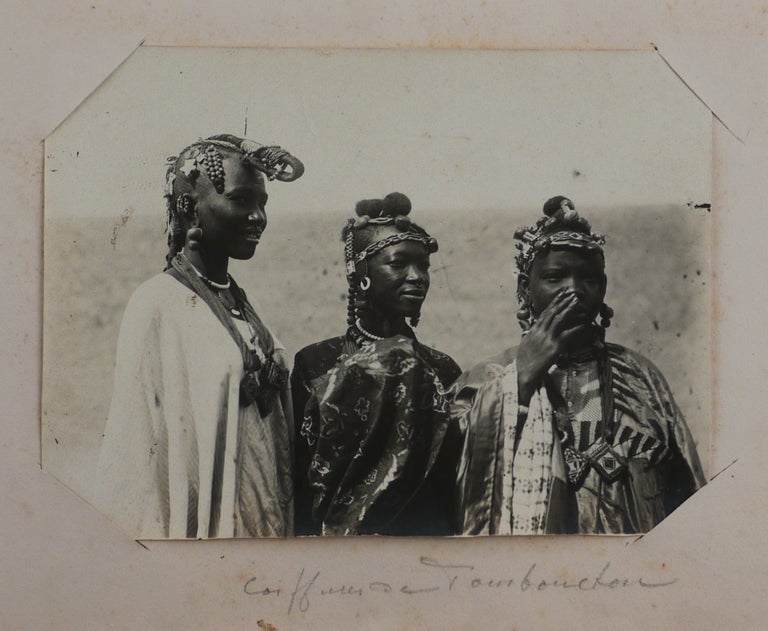 Item #612 [Album with 67 Early Original Photographs (Gelatin Silver photos and Cyanotypes) of French Sudan, Showing Hombori (French Military Post, Hombori Mountains, Native Village), Timbuktu, Bourem, Bamba, “Le Mage” Niger River Steamer, Portraits of Fula, Songhai, Tukulor, Ikelan, Tuareg, Moor and Bambara People, “Notables de Tombouctou,” Family of a Local Chief, Scenes with Native Soldiers Paying Honours to the Flag, Public Celebration during the 14th of July 1901, &c.]. AFRICA - MALI - TIMBUKTU.