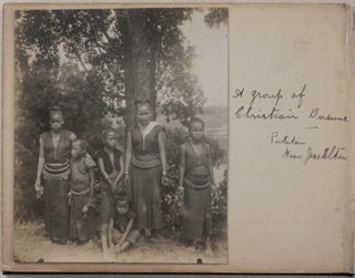 [Album with 108 Original Gelatin Silver Photographs, Including Over Sixty Images Taken in British North Borneo and Sarawak Raj and Showing Sandakan and Environs, Mount Kinabalu, Sekong Rubber Estate, Portraits of Dayak, Kenyah, Kedayan and Dusun People, “Dyak Head Hunting Feast,” “Dyak Long House & Skulls,” &c.; With Over Forty Views of Shanghai, Newson’s Residence, Portraits of Him and His Daughter, &c.].