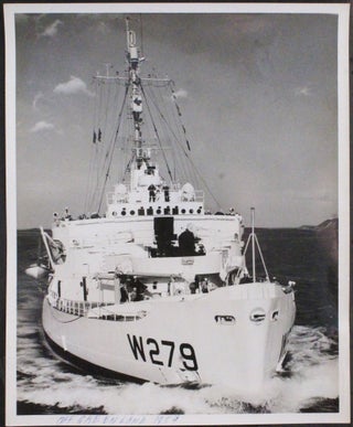 [Album with 106 Original Gelatin Silver Photographs of the USCGC Eastwind’s Annual Summer Cruise to Greenland (Thule Air Force Base, Cape Etoh, Grondal, and Godthab) Showing American & Canadian Vessels (USS Glynn, USCGC Westwind, and Labrador), Prominent Arctic Explorer Donald Macmillan, a Helicopter Crash Landing on the Ice, “Frog Men” Preparing for Underwater Dynamiting, Local Eskimos Posing with the Captain Rhanke, etc.; Also with the Images of Sailors Meeting Danish Admiral on the Fourth of July, Having a Beer Party, and Celebrating the Initiation Ceremony in Costumes.]